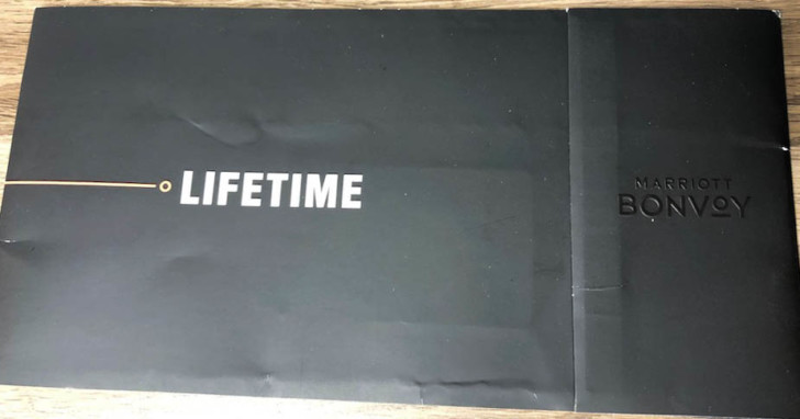 a black envelope with white text