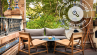 a patio with a table and chairs