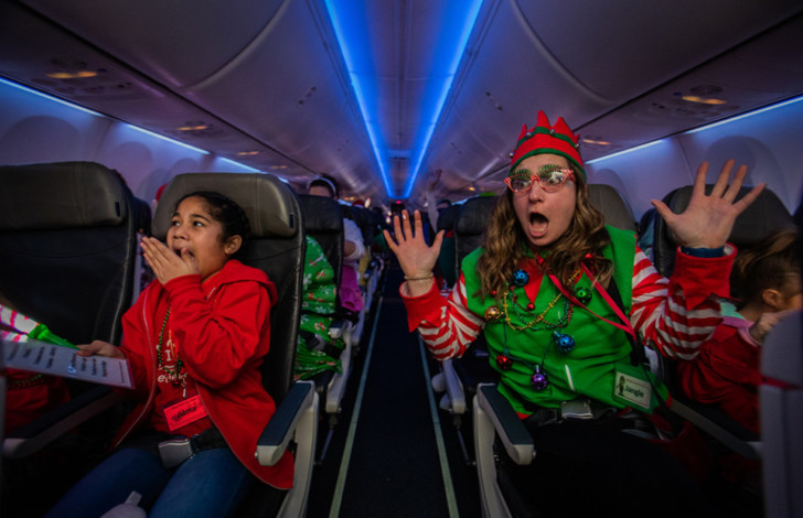 people in an airplane with people in clothing