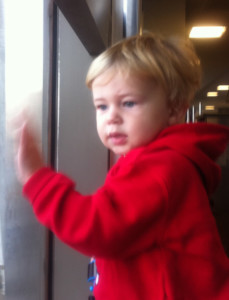 a child in a red jacket