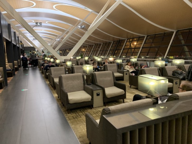 a room with chairs and tables
