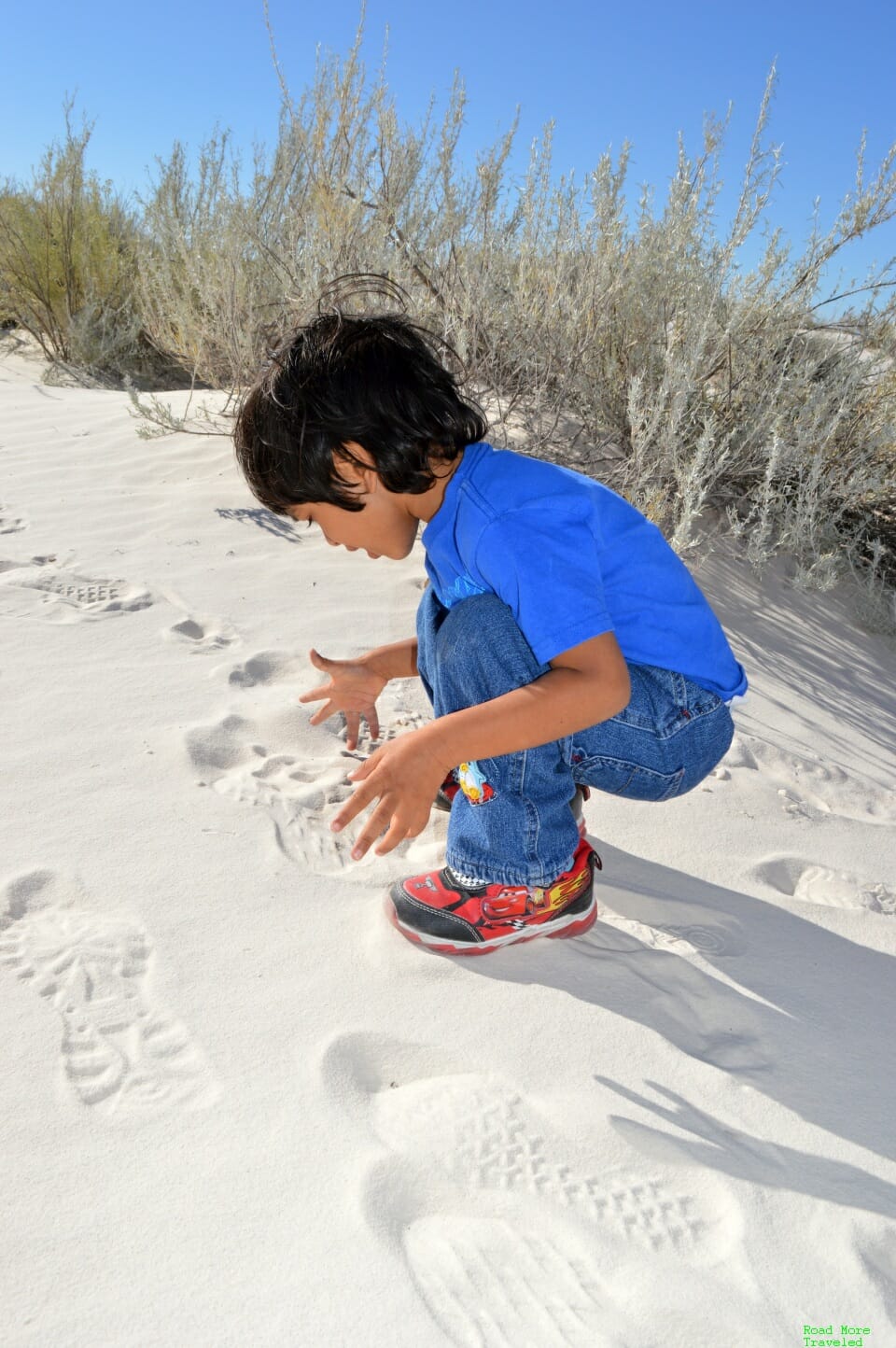 A child's wonderment at the sand