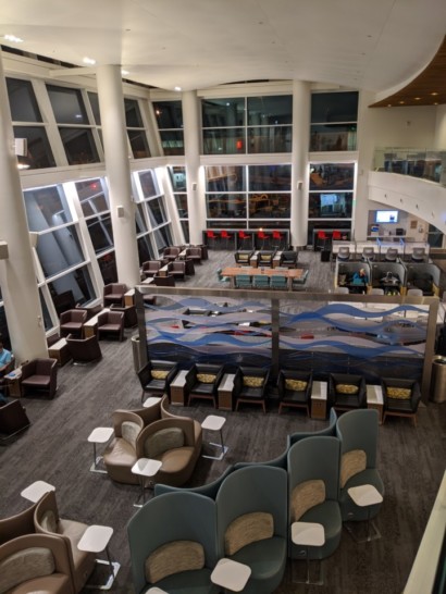 a room with chairs and tables