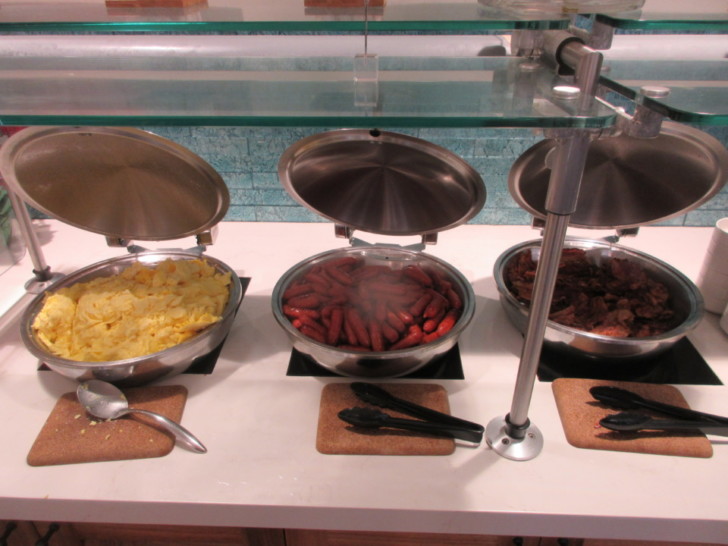 a buffet with food in bowls