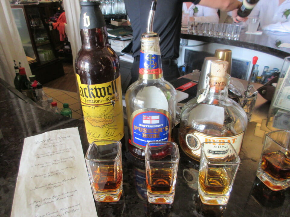 a group of bottles of alcohol on a table