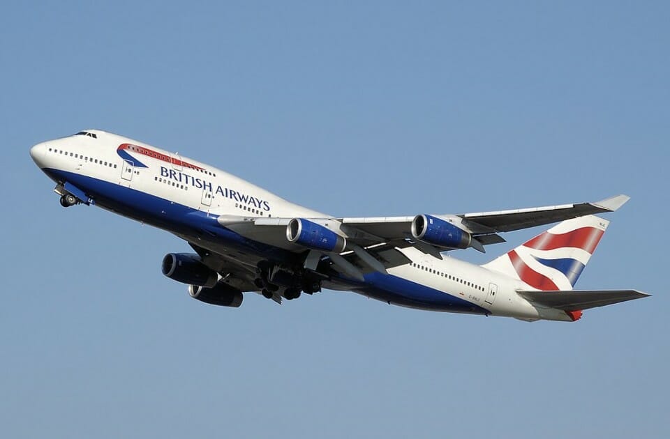 a large airplane flying in the sky