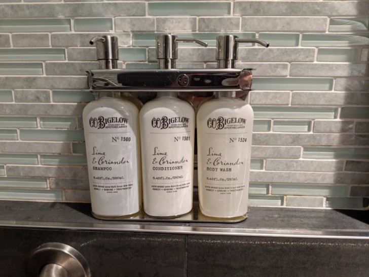 a group of bottles of shampoo and conditioner