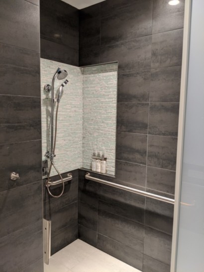 a shower with a shower head