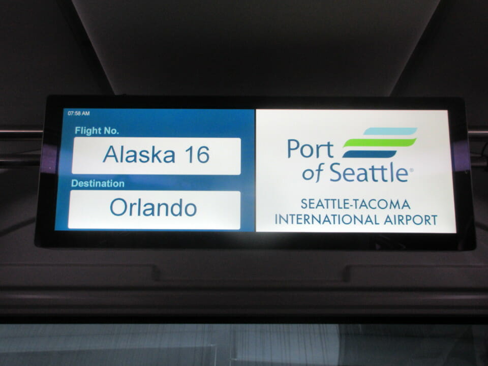 a sign with a name and address