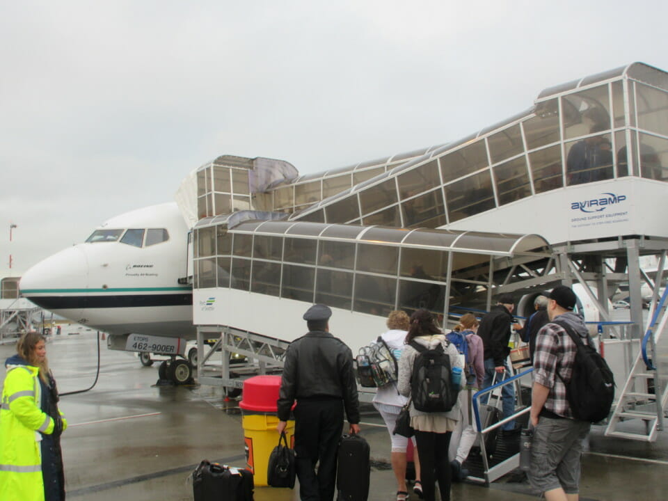 people boarding an airplane