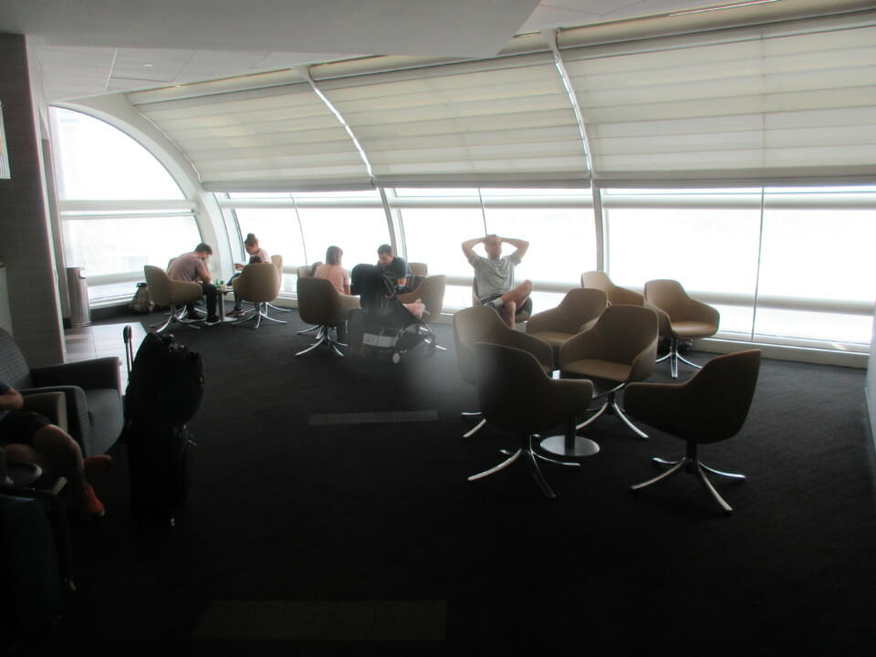 a group of people sitting in a lounge area