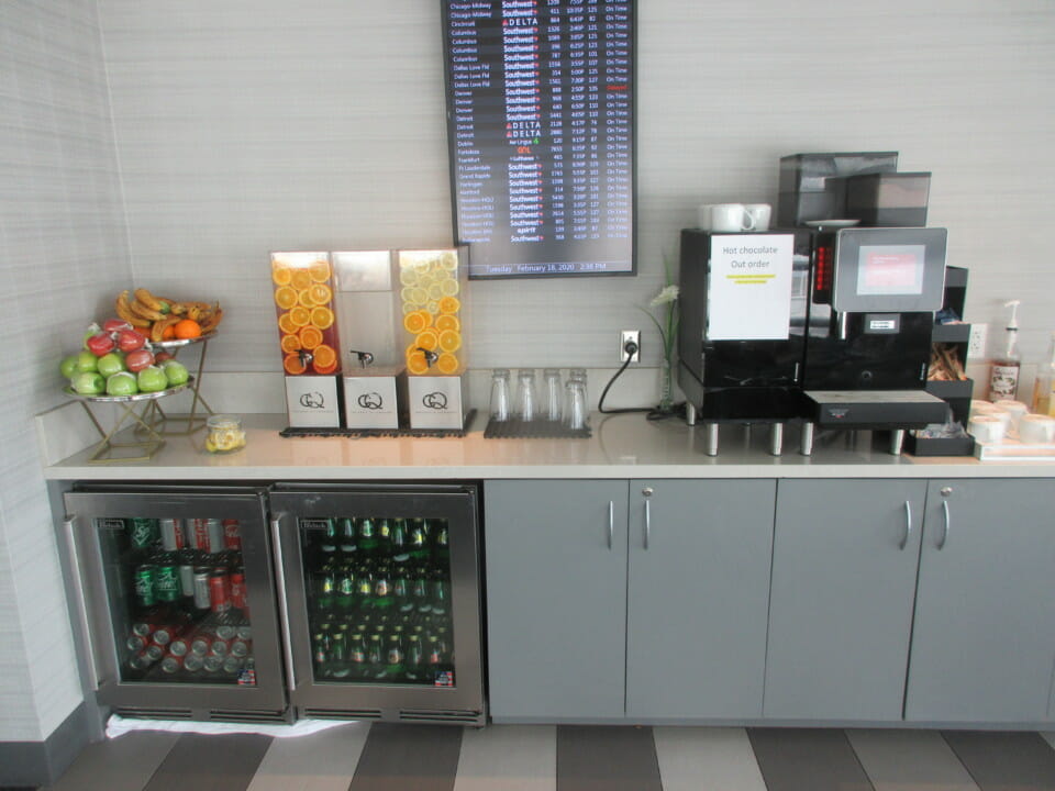 a refrigerated beverage coolers and drinks on a counter