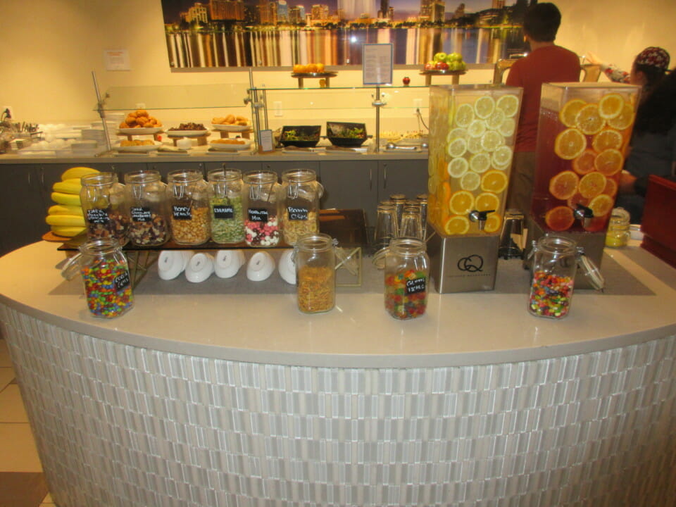 a counter with different types of food in containers