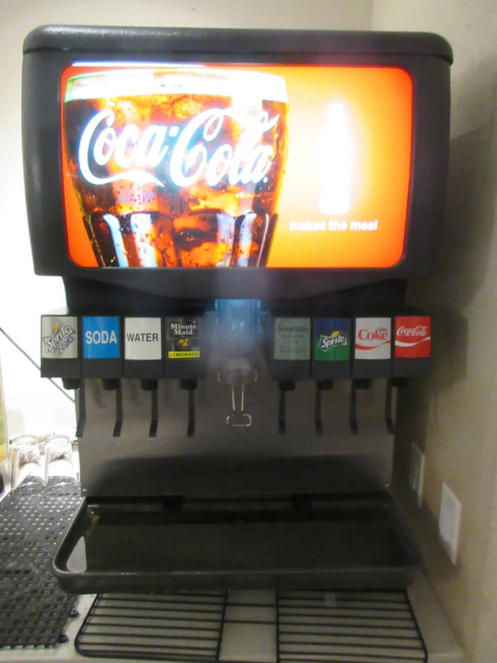 a soda dispenser with a screen