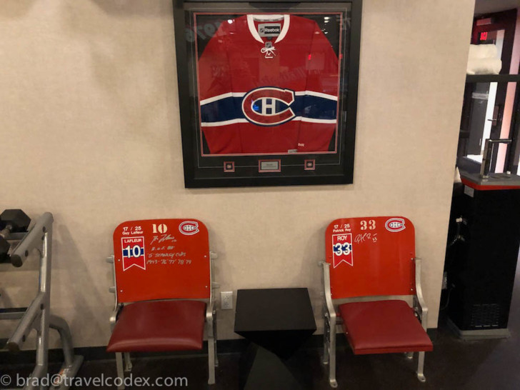 a framed picture of a jersey and chairs