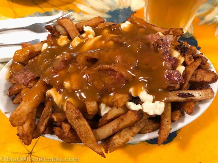 a plate of food with a drink