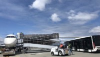 a plane and a bus at an airport