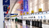 a man walking in a large airport