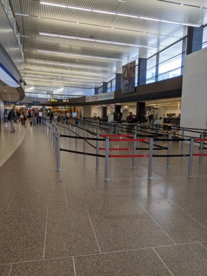a line of barriers in a airport