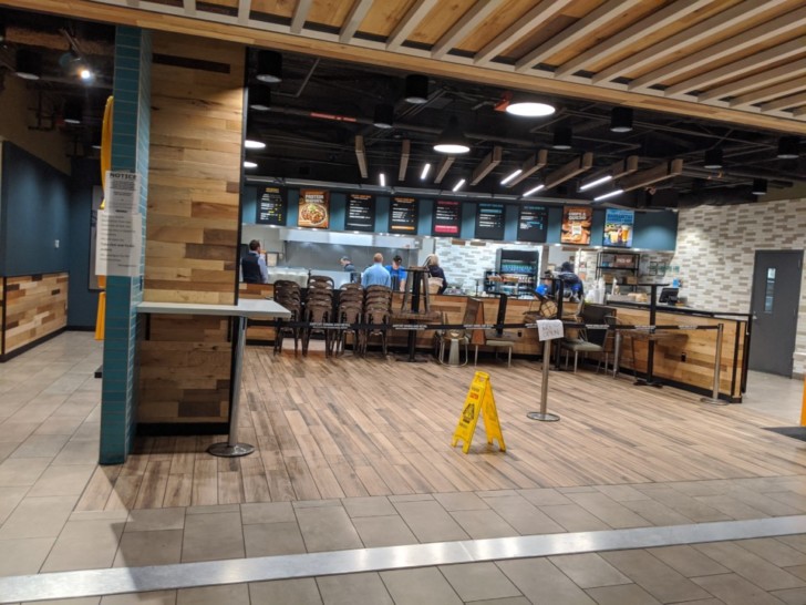 a restaurant with people in the background