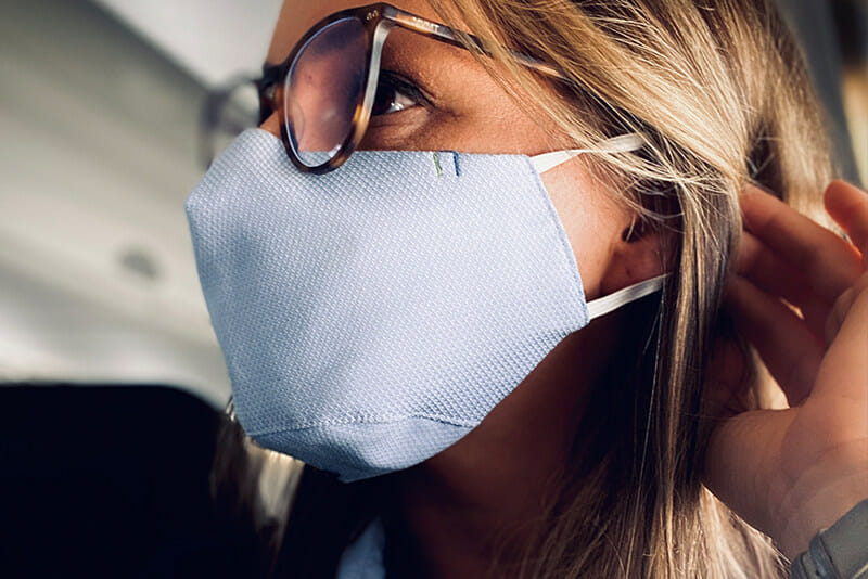 a woman wearing a face mask