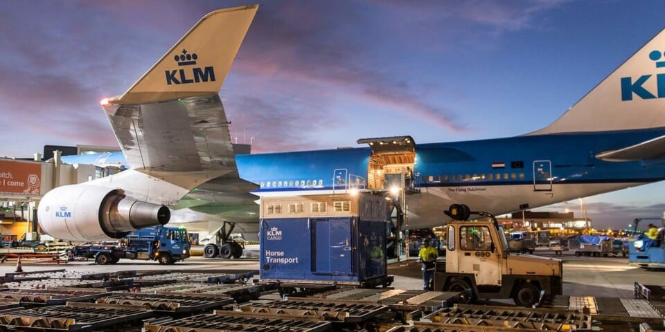 a plane being loaded with cargo