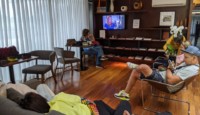 a group of people sitting in chairs in a room