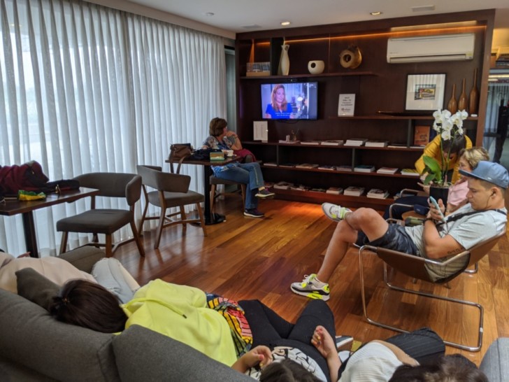 a group of people sitting in chairs in a room