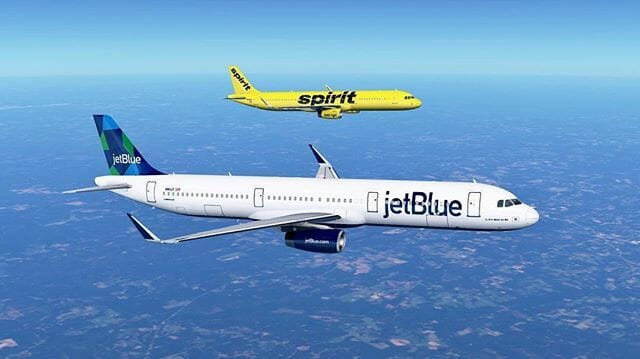a couple of airplanes in the sky