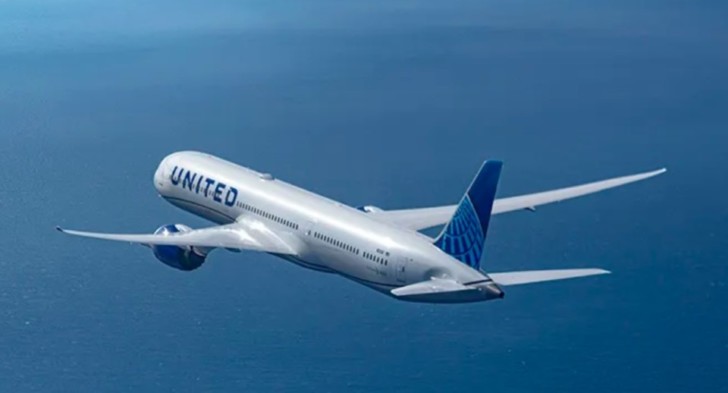 a plane flying in the sky