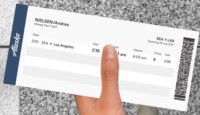 a person holding a ticket