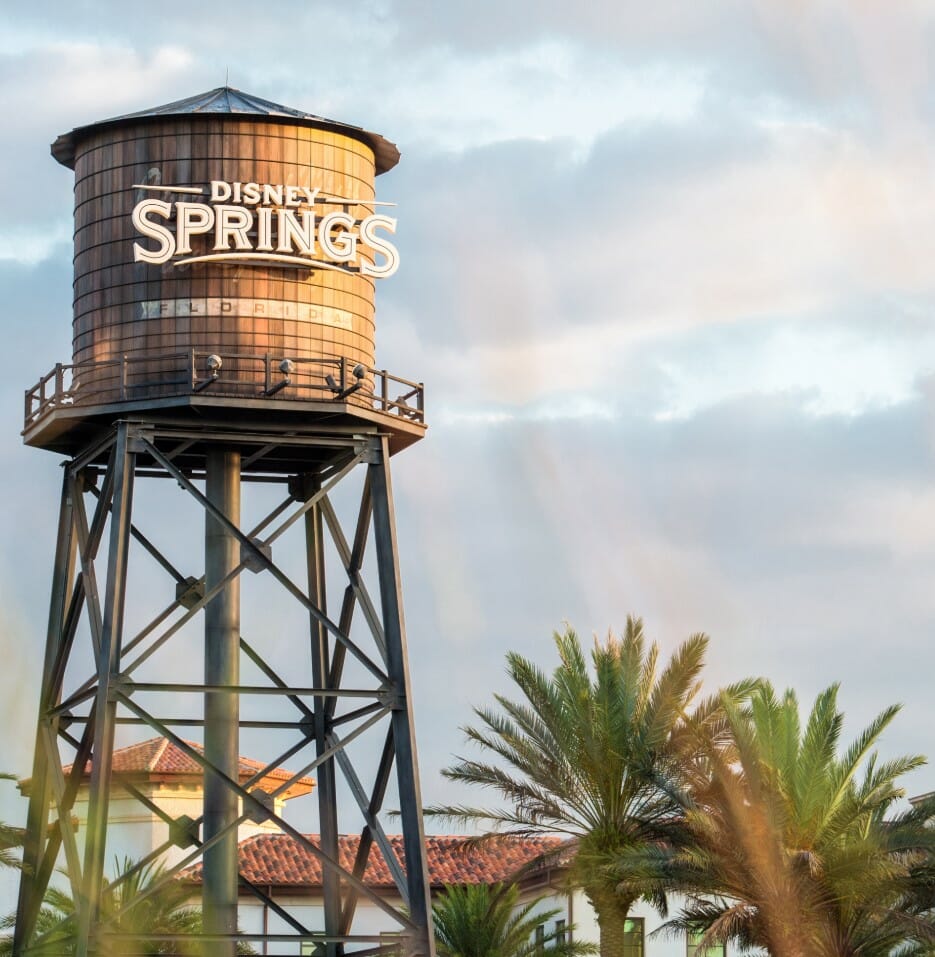 a water tower with a sign on it