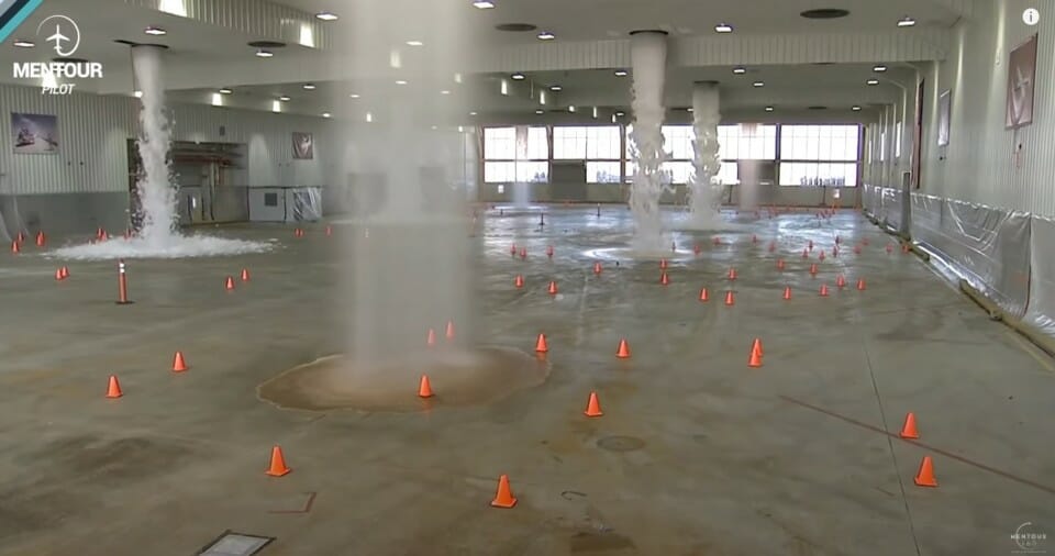 water spraying water into a room