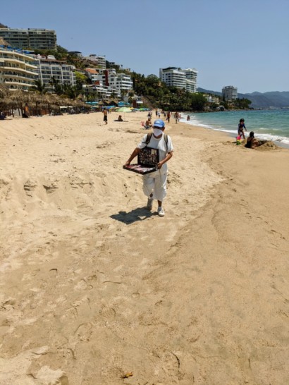 a man walking on a beach