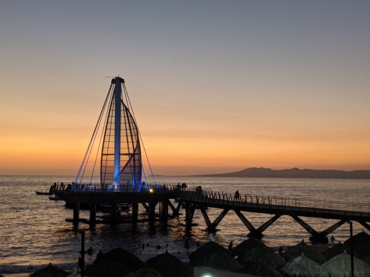 a dock with a sailboat on it