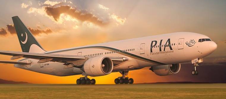 a large white airplane on a runway
