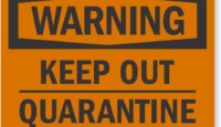 a close-up of a warning sign