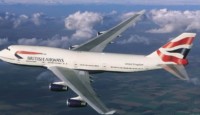 a large white airplane flying in the sky