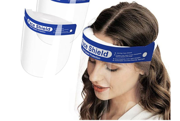 a woman wearing a face shield