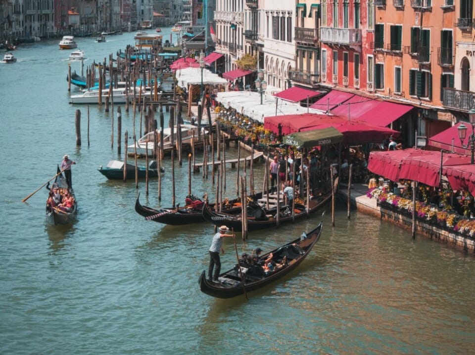 a group of boats on a canal