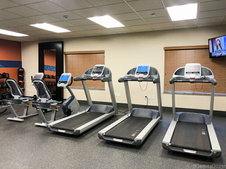 a group of treadmills in a room