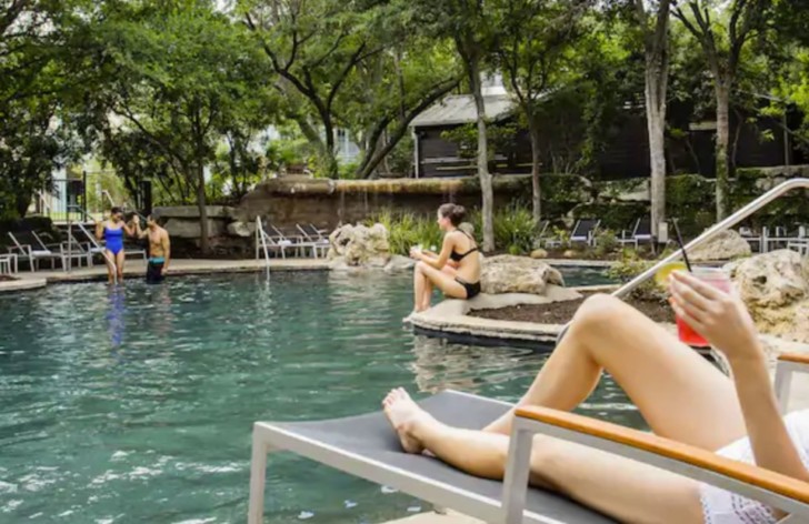 people sitting in a pool