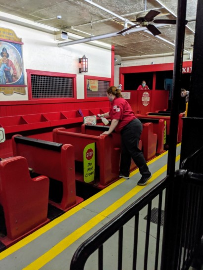 a woman standing on a booth