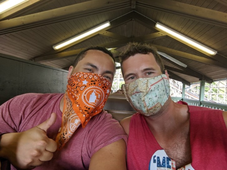 two men wearing face masks