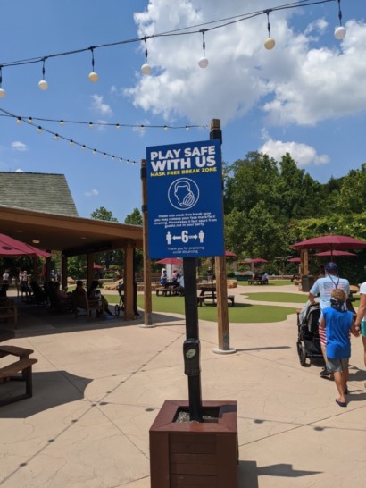 a sign in a park