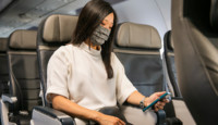 a woman wearing a mask on her face
