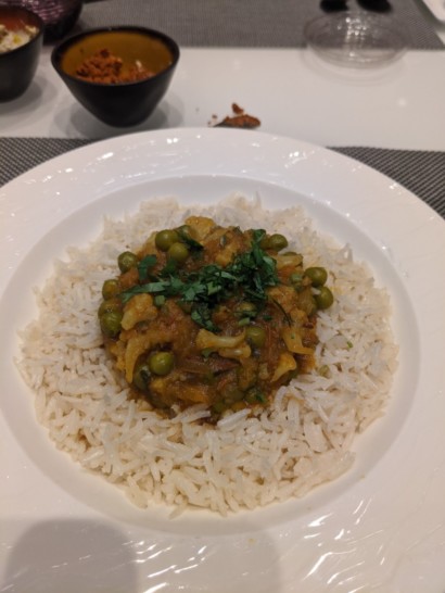 a plate of rice and curry