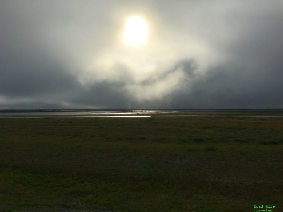 Mid-morning Arctic sun through clouds, Deadhorse, AK