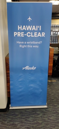 a blue sign with white text