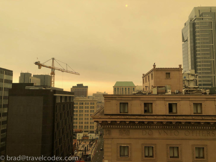 a city with cranes and buildings